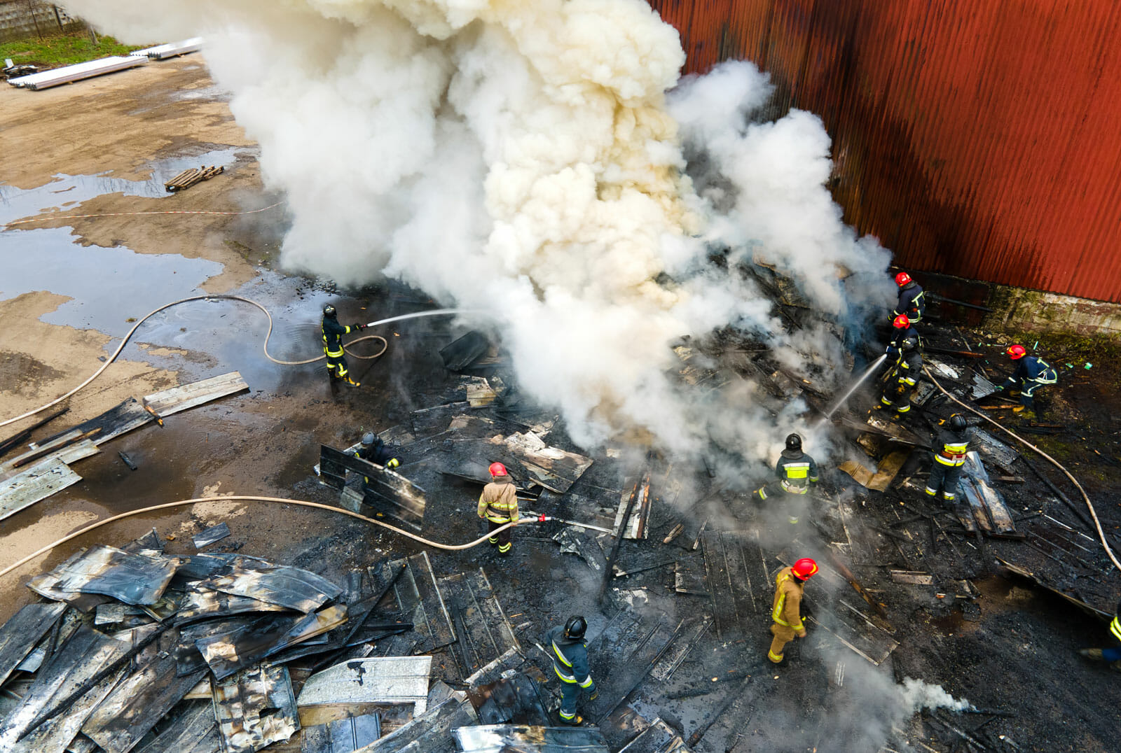 aerial-view-of-firefighters-extinguishing-fire-in-2022-02-09-06-28-17-utc